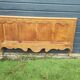 antique headboard in cherry wood