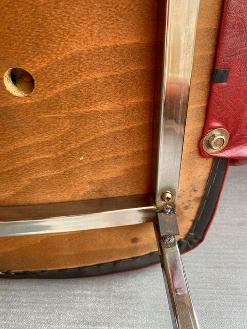 Fauteuil rouge années 60 en skaï