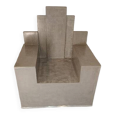 Architectural armchair in polished concrete – Unique artisan piece.