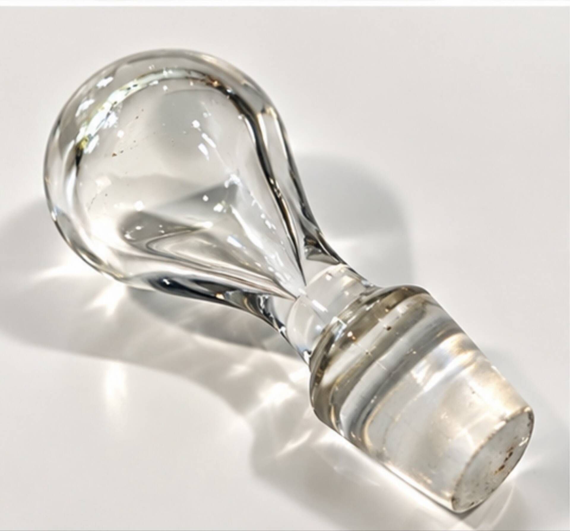 Art glass bottle signed Didier SABA, with cobalt blue decoration and inclusions.