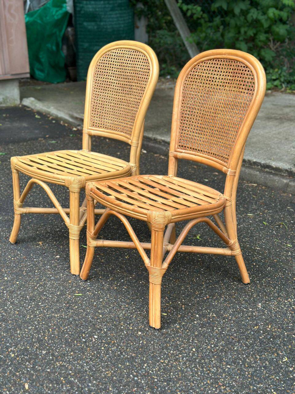2 rattan and caned chairs in colonial bistro style from the 1990s.