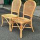 2 rattan and caned chairs in colonial bistro style from the 1990s.