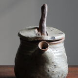Homemade teapot in pyrity sandstone