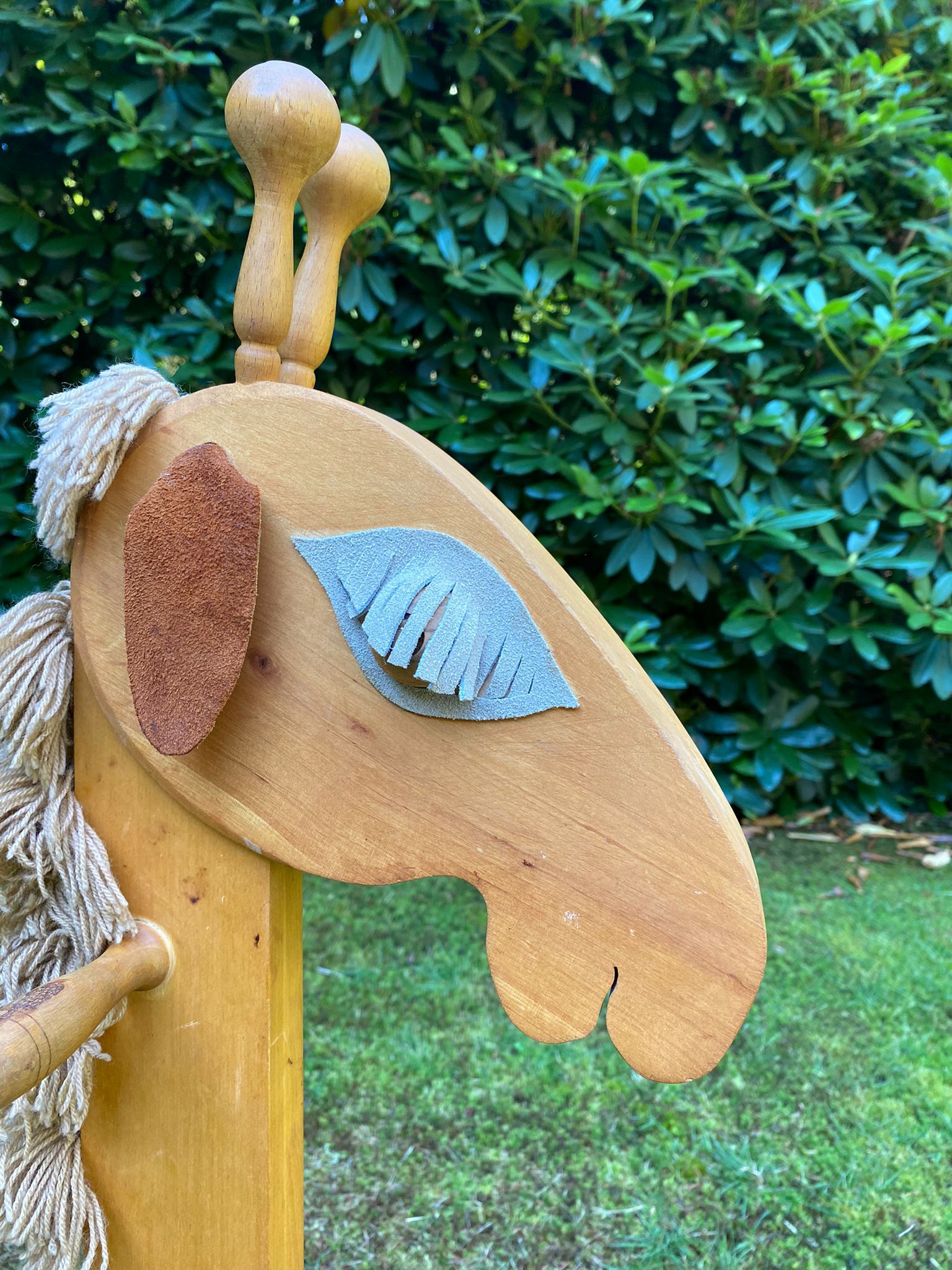 Vintage leather and pinewood rocking horse, giraffe, ca. 1970s