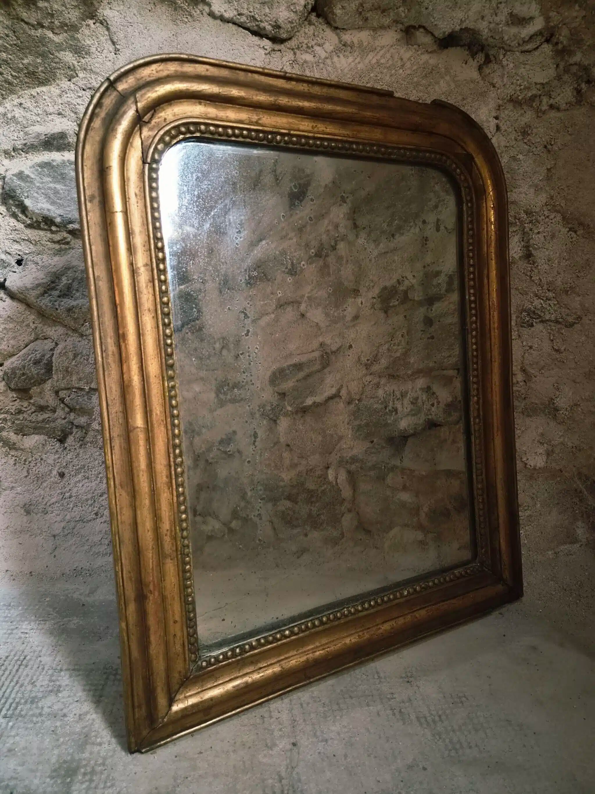 Antique French Louis Philippe mirror, gilded mercury mirror, 19th century.