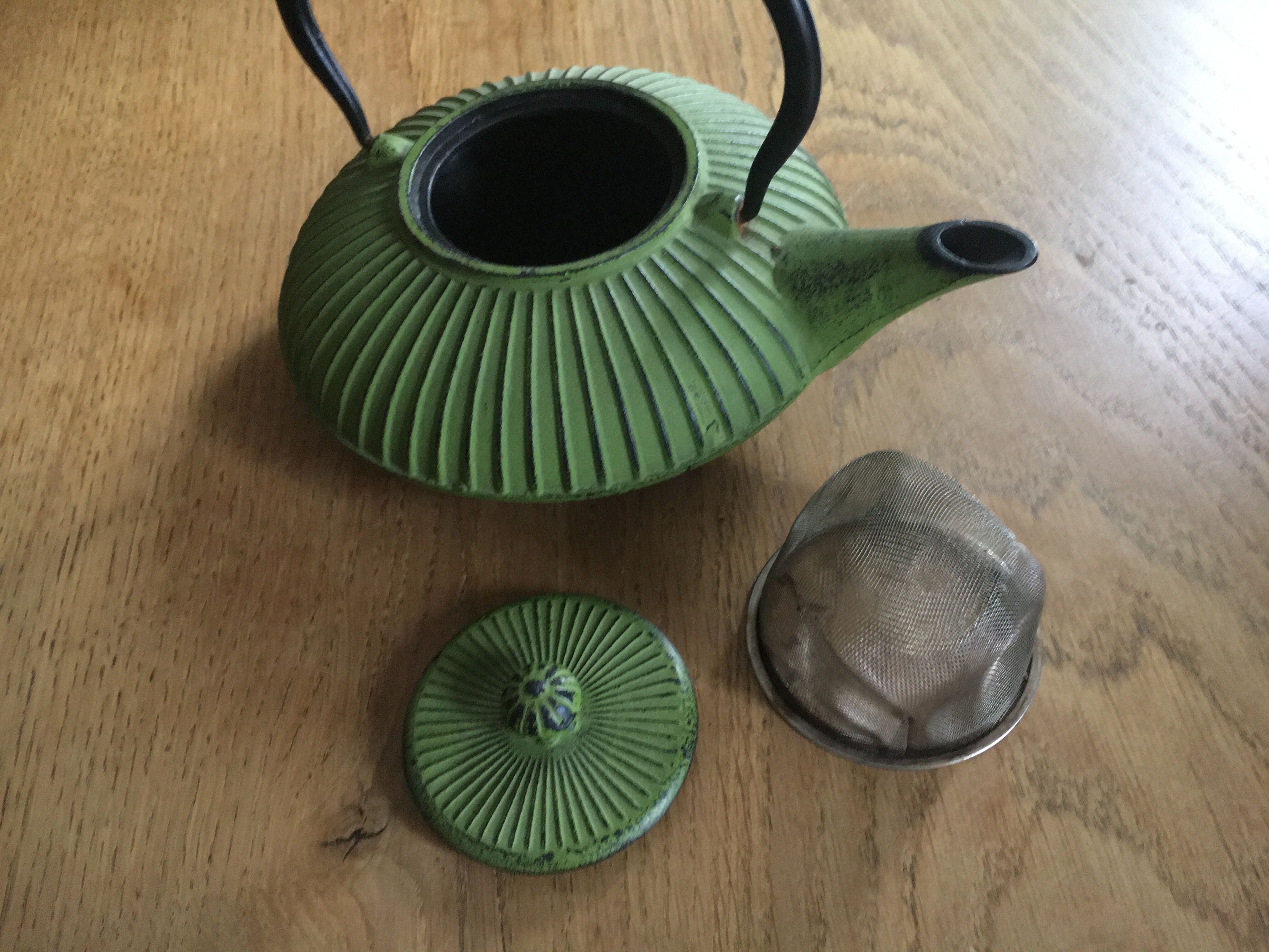 Green cast iron teapot