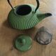 Green cast iron teapot