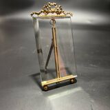 Glass and metal frame