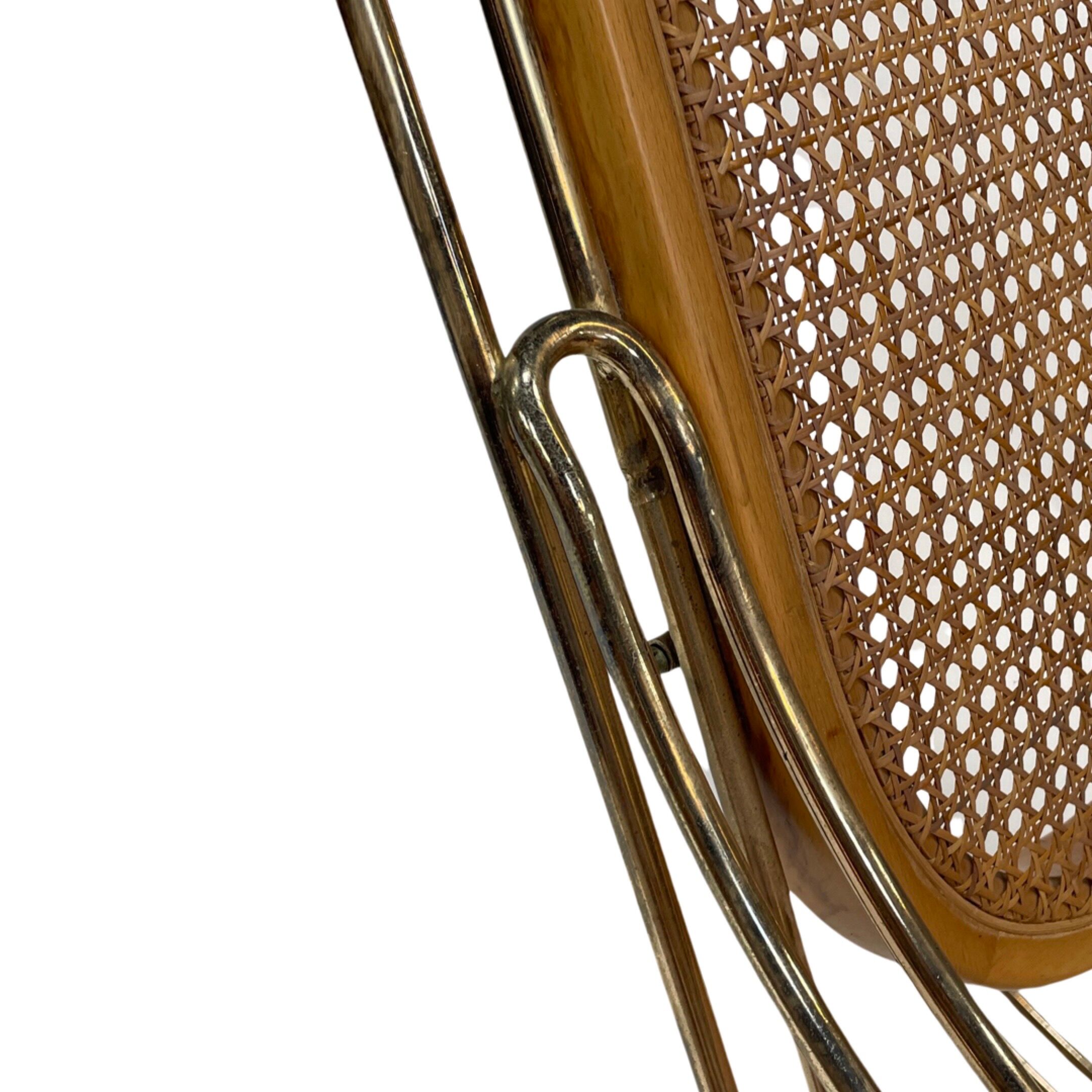 Vintage brass curved wooden rocking chair