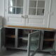 Art Deco furniture revisited in gray green and placed on wheels.