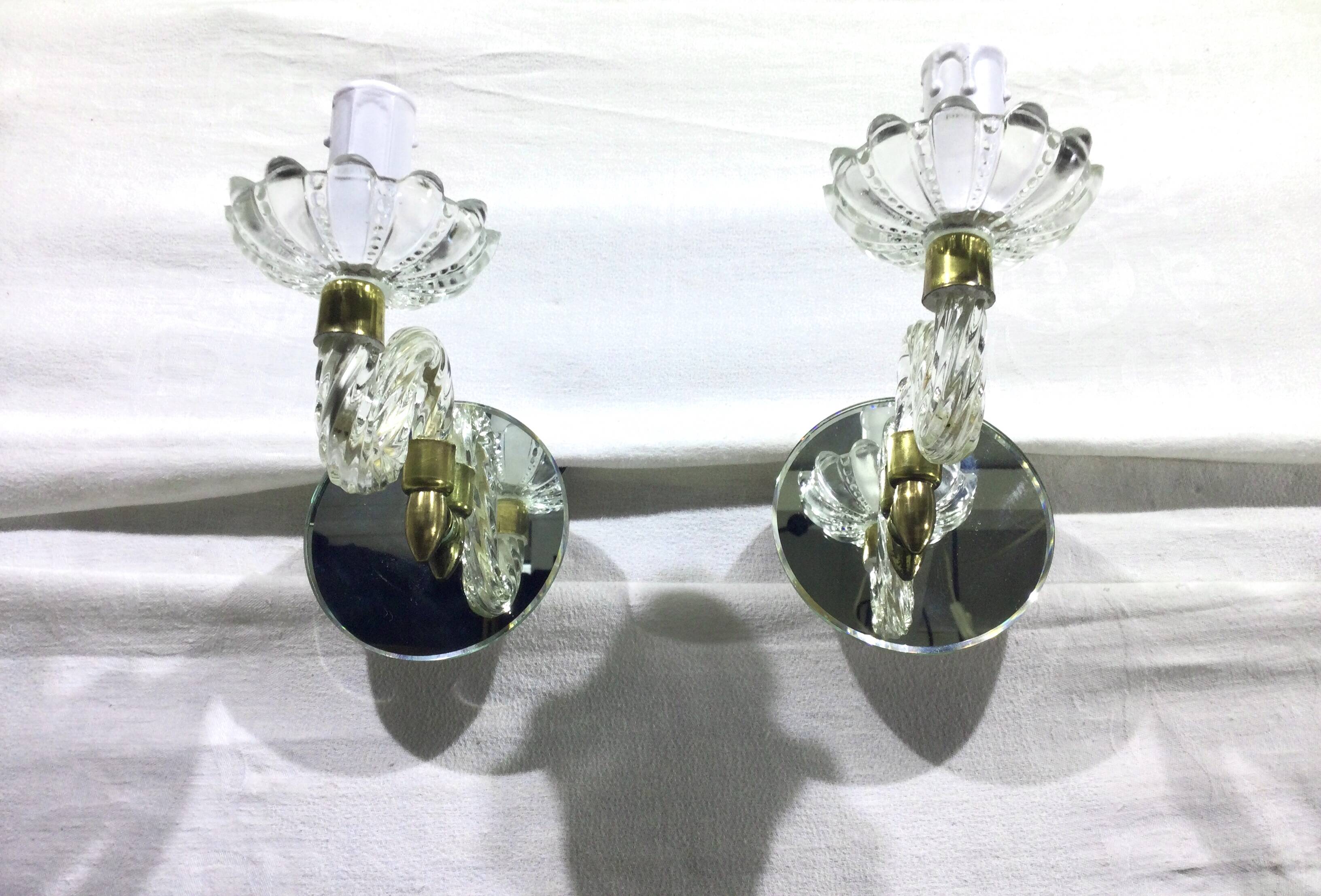 Pair of glass and mirror sconces