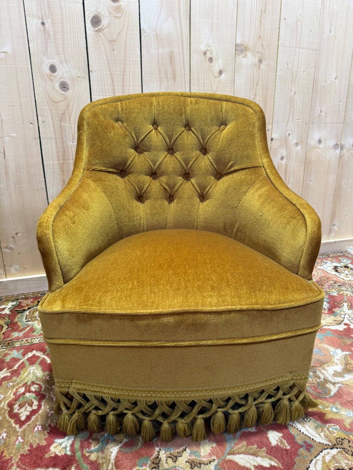 Pair of Napoleon III crapaud armchairs in mustard yellow velvet.