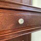 Antique wooden coat rack with mirror and shelf.