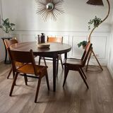 Dining table in rosewood, for 4 to 6 people.