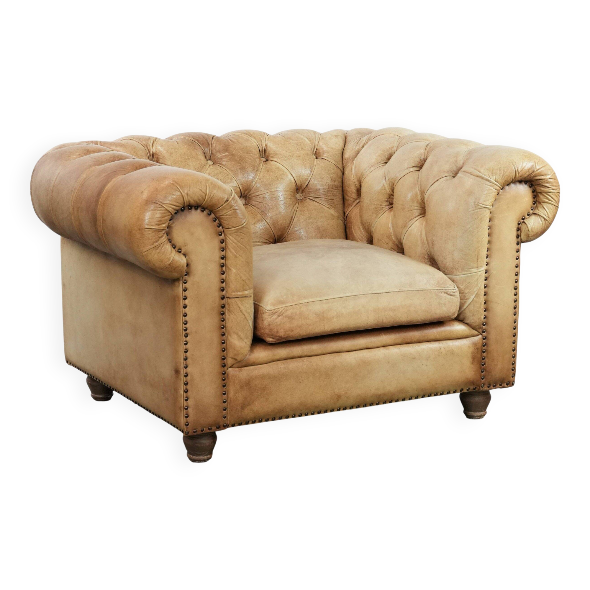 Chesterfield armchair made of cowhide leather in a light cognac colour