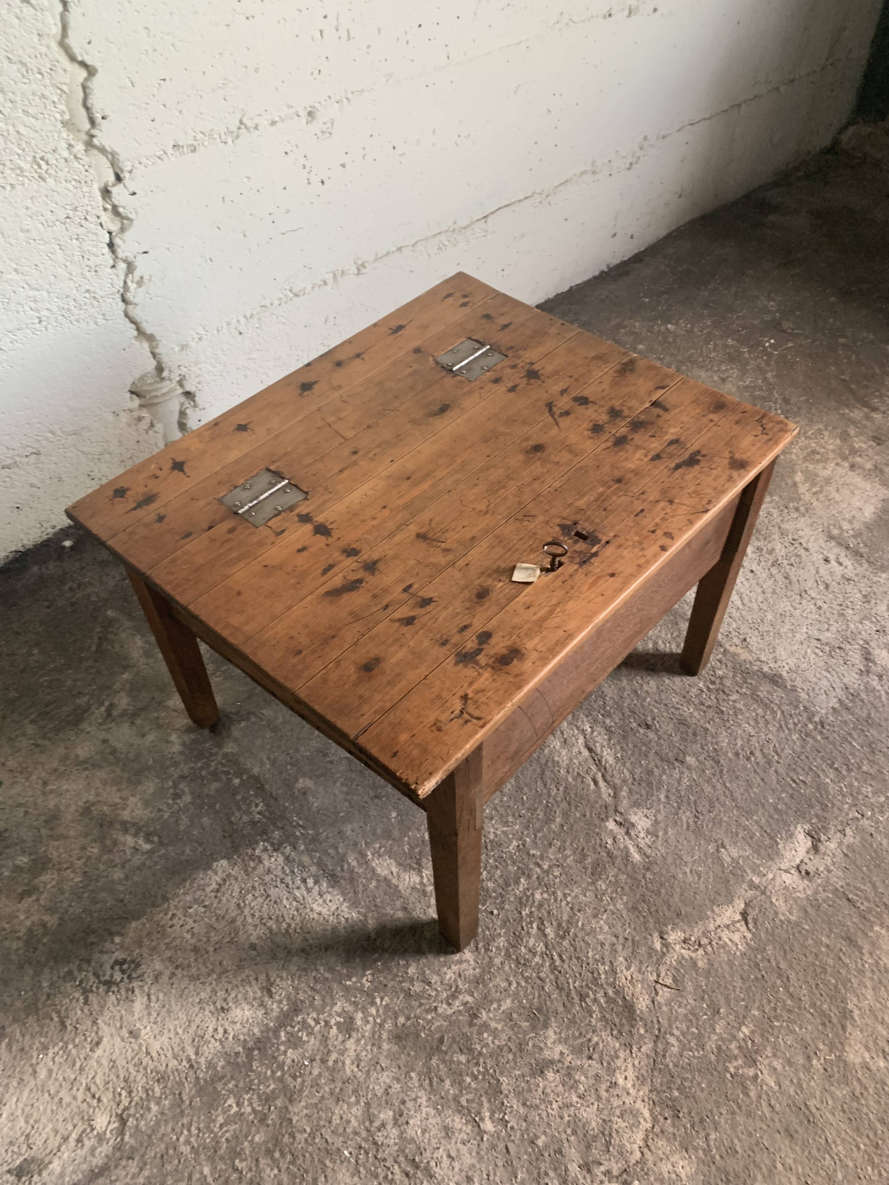 Coffee table with a key storage compartment.