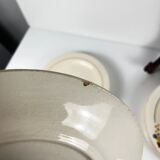 Set of 10 flat plates Longwy, 20th century, floral decoration.