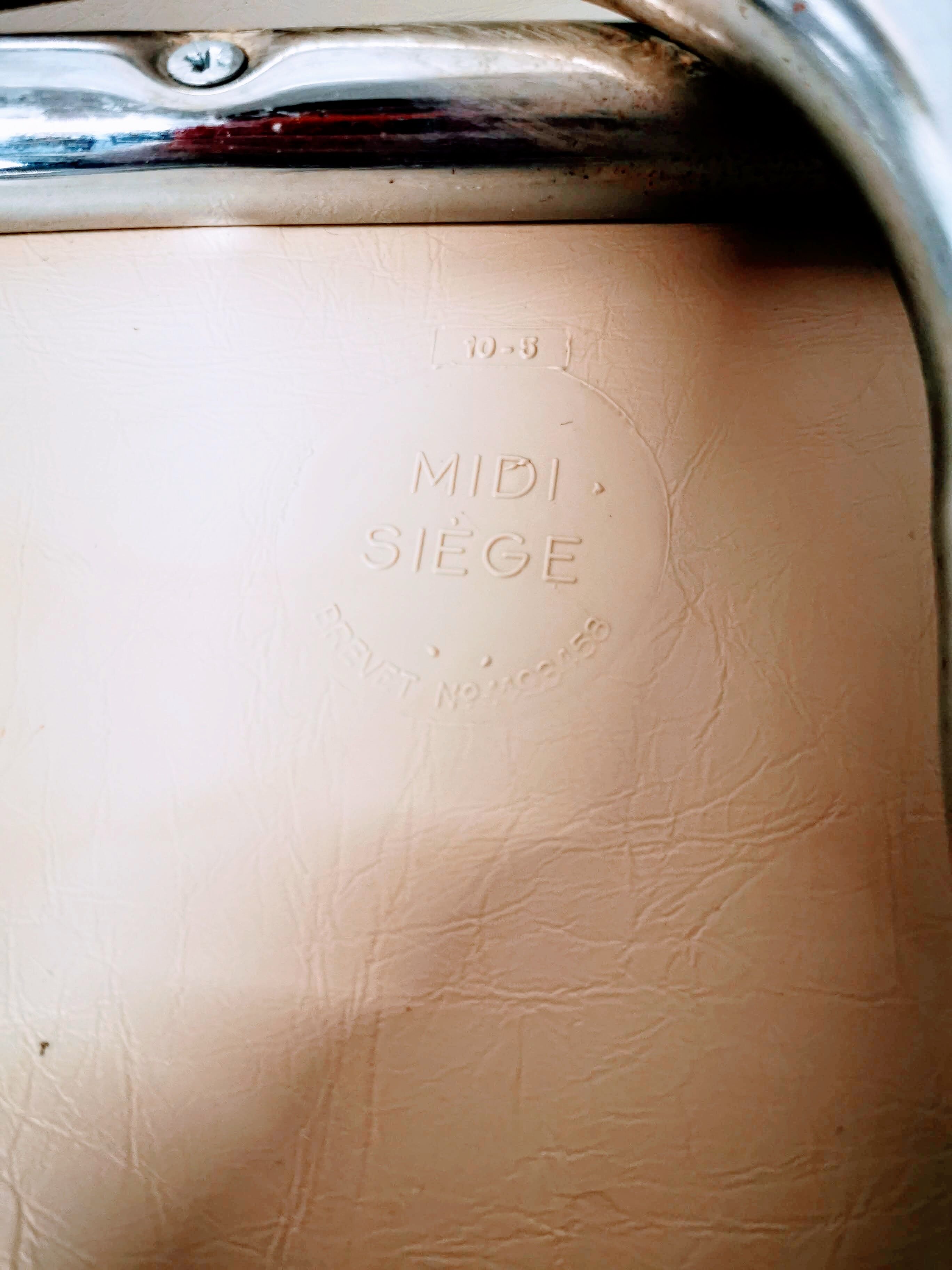 Pair of chrome and skai chairs