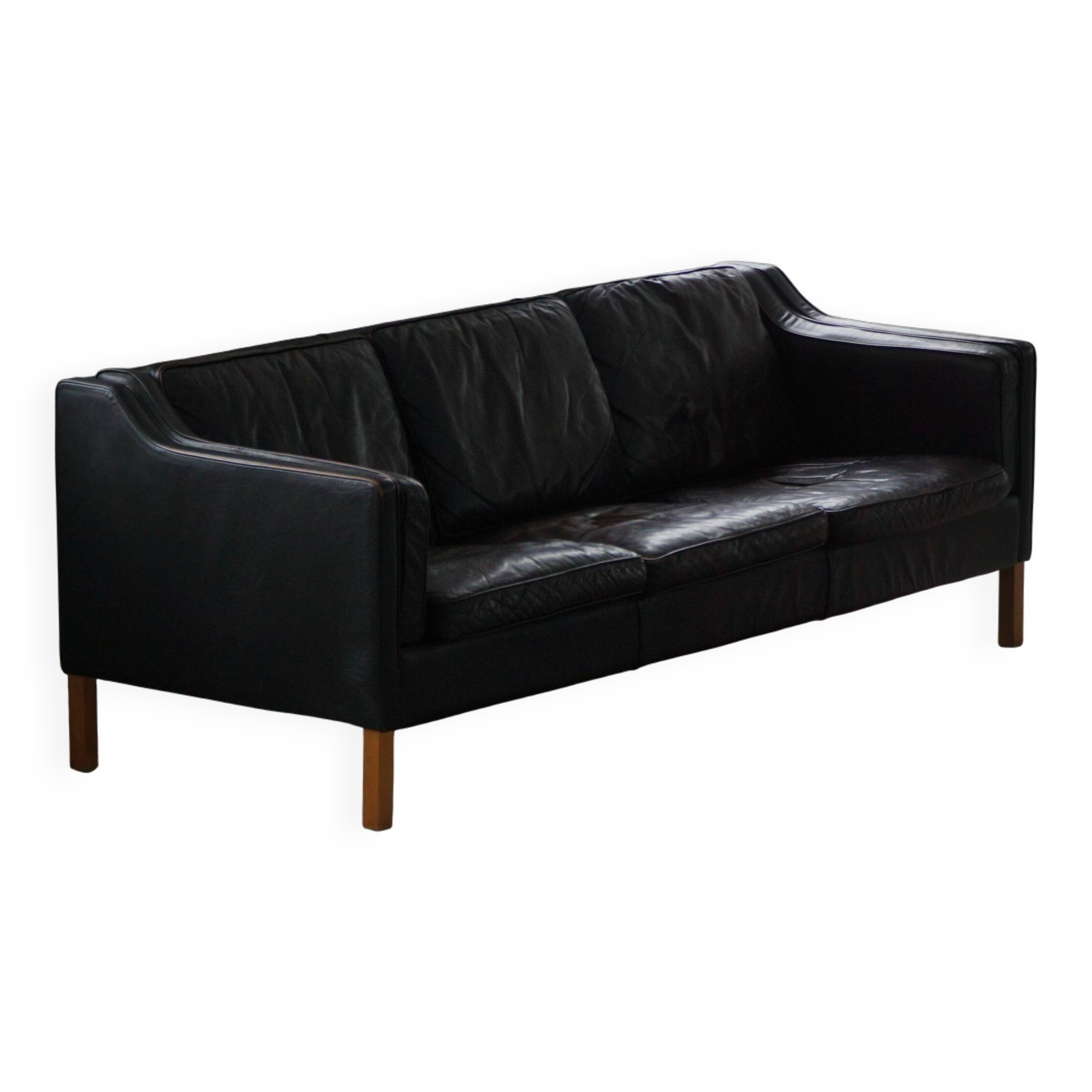 Three-seater canapé by Mogens Hansen, mid-century, in patinated black leather and solid beech.