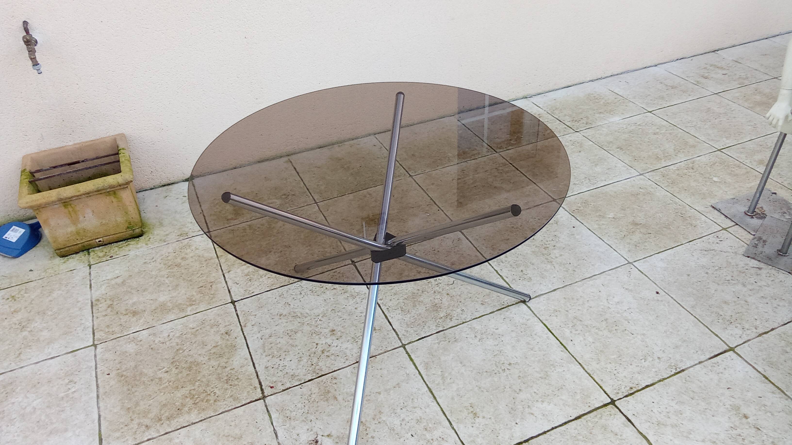 Vintage 70s table with glass and chrome legs.