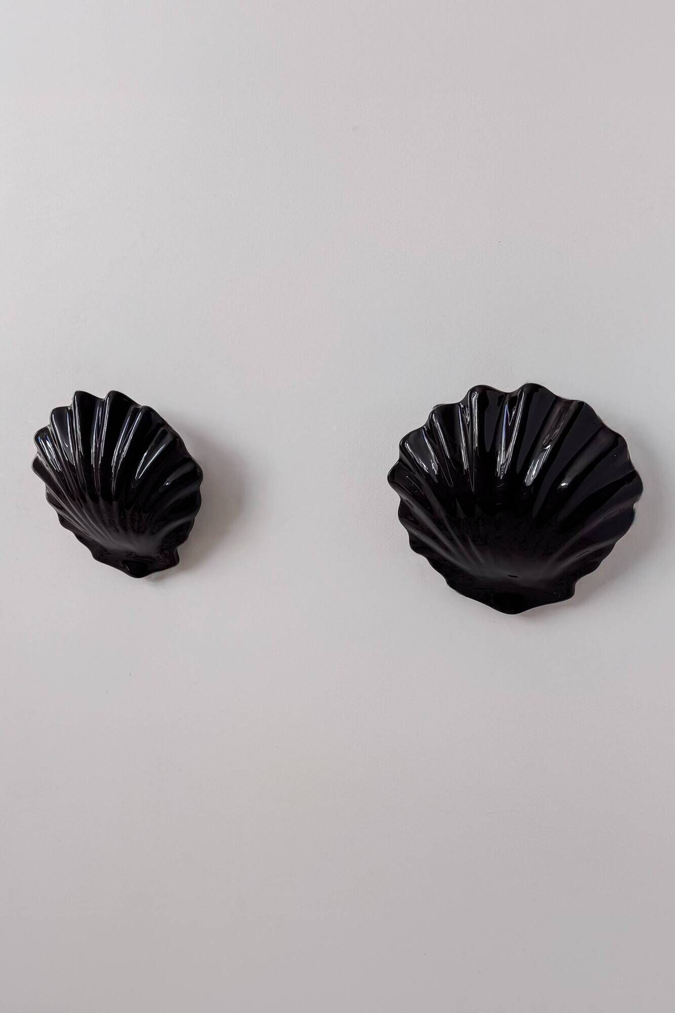 Pair of vintage wall lights in black porcelain, France 1970.