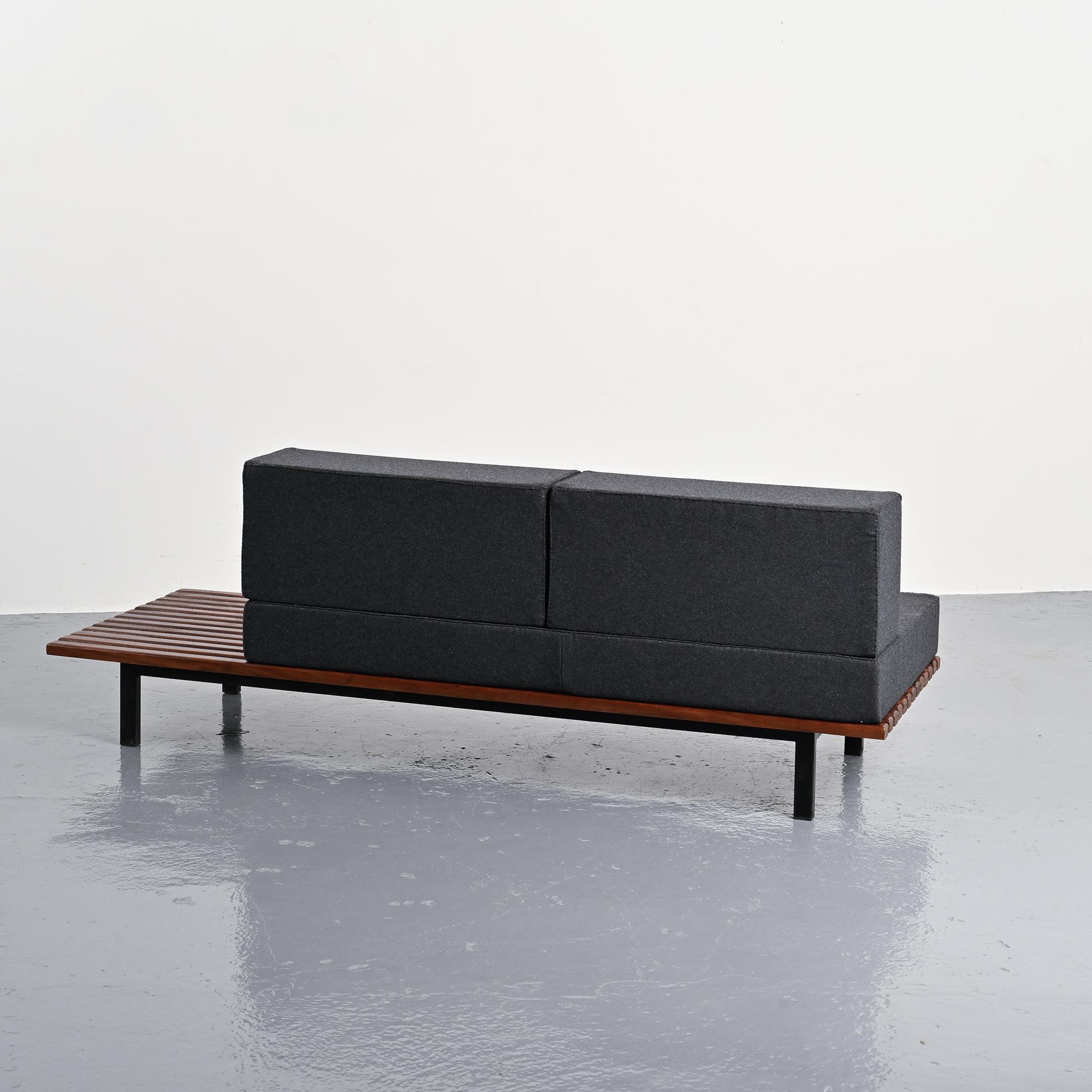 Cansado bench in mahogany by Charlotte Perriand, circa 1962.