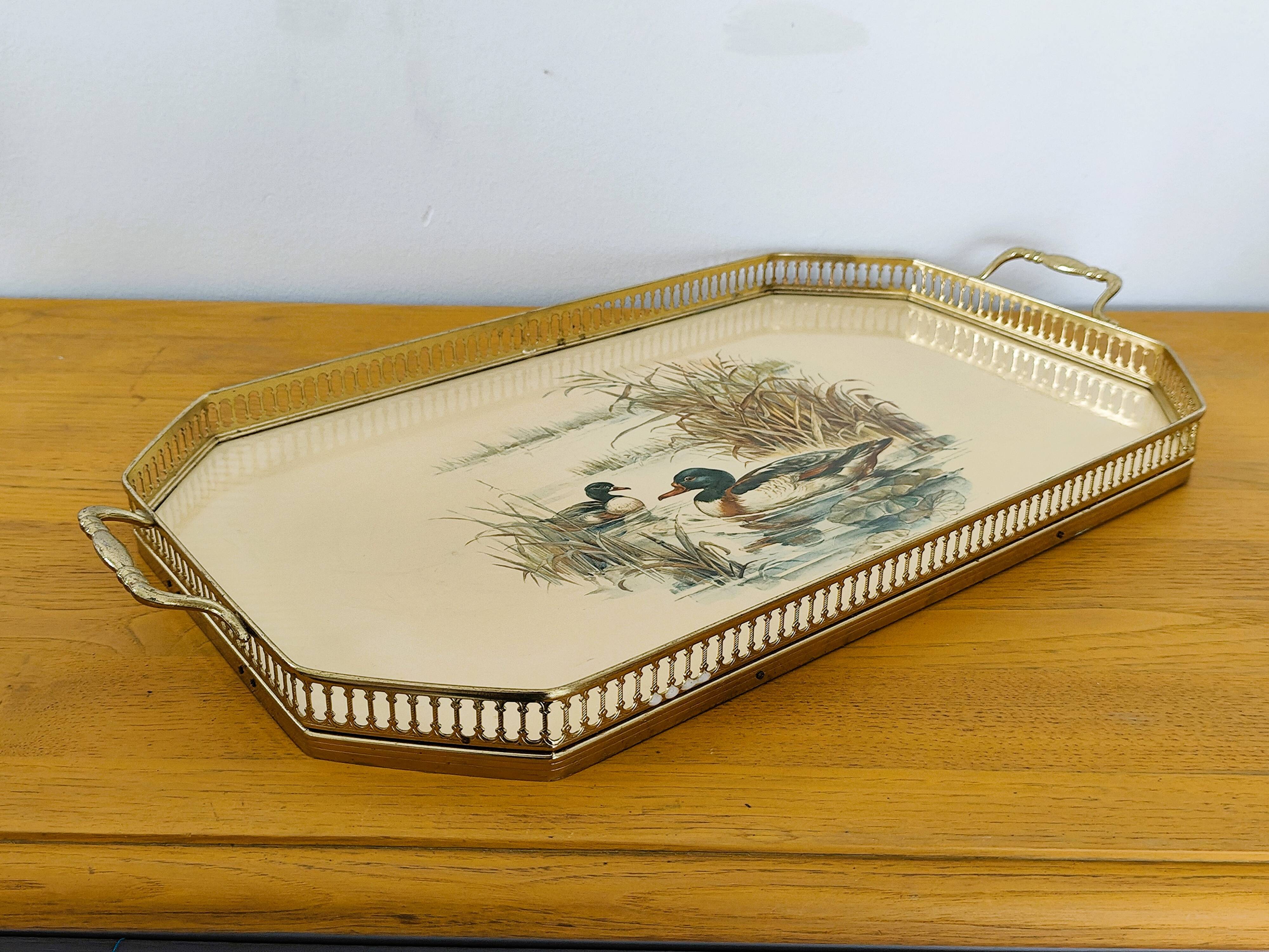 Vintage service tray with a golden gallery and mirror, decorated with ducks.