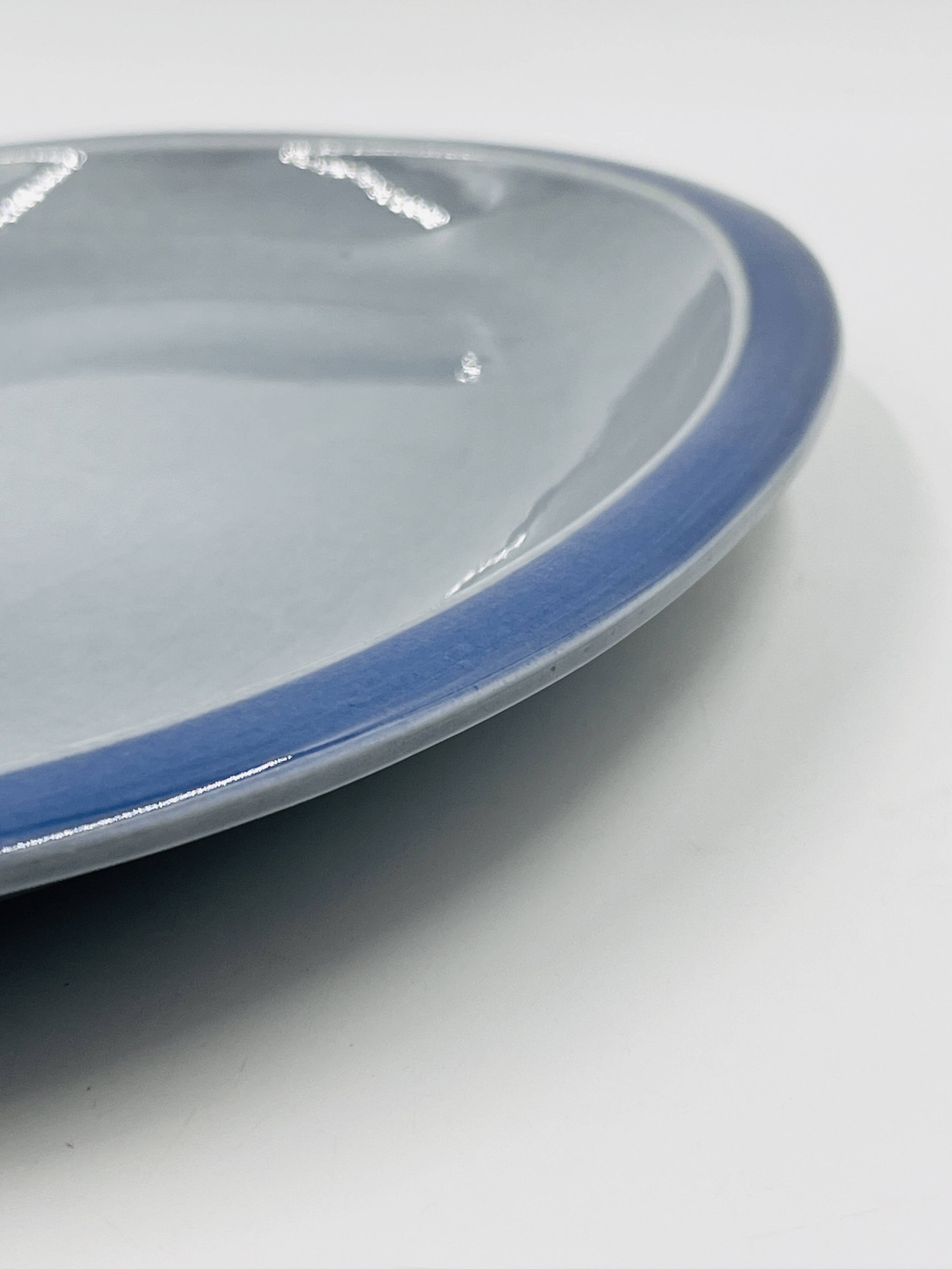 Set of two Boch blue dishes