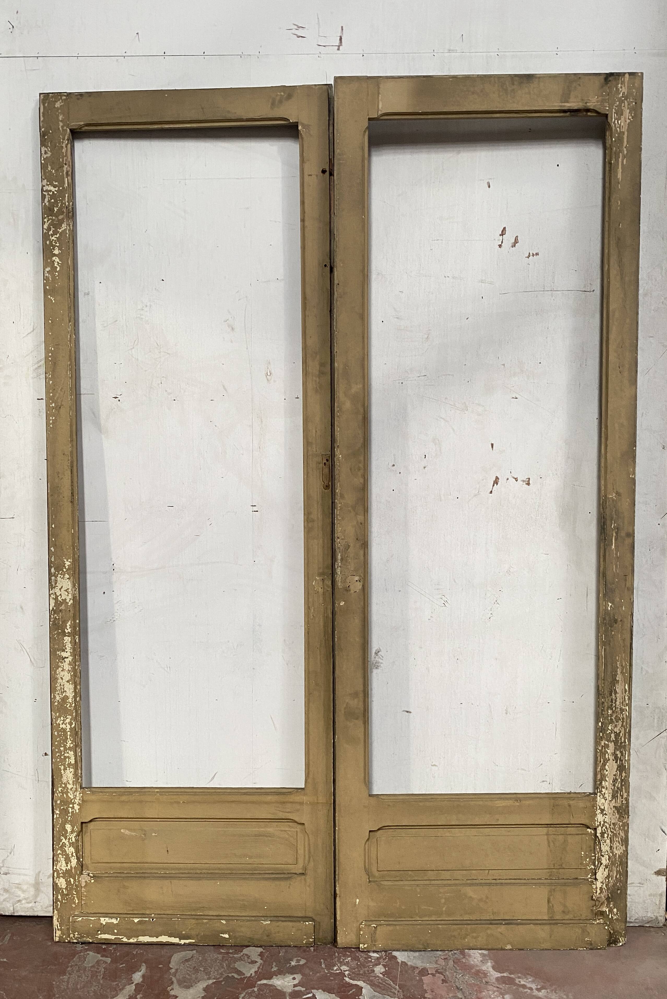 Double glass and patinated fir passage doors, 20th century