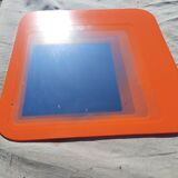 Vintage orange glass mirror