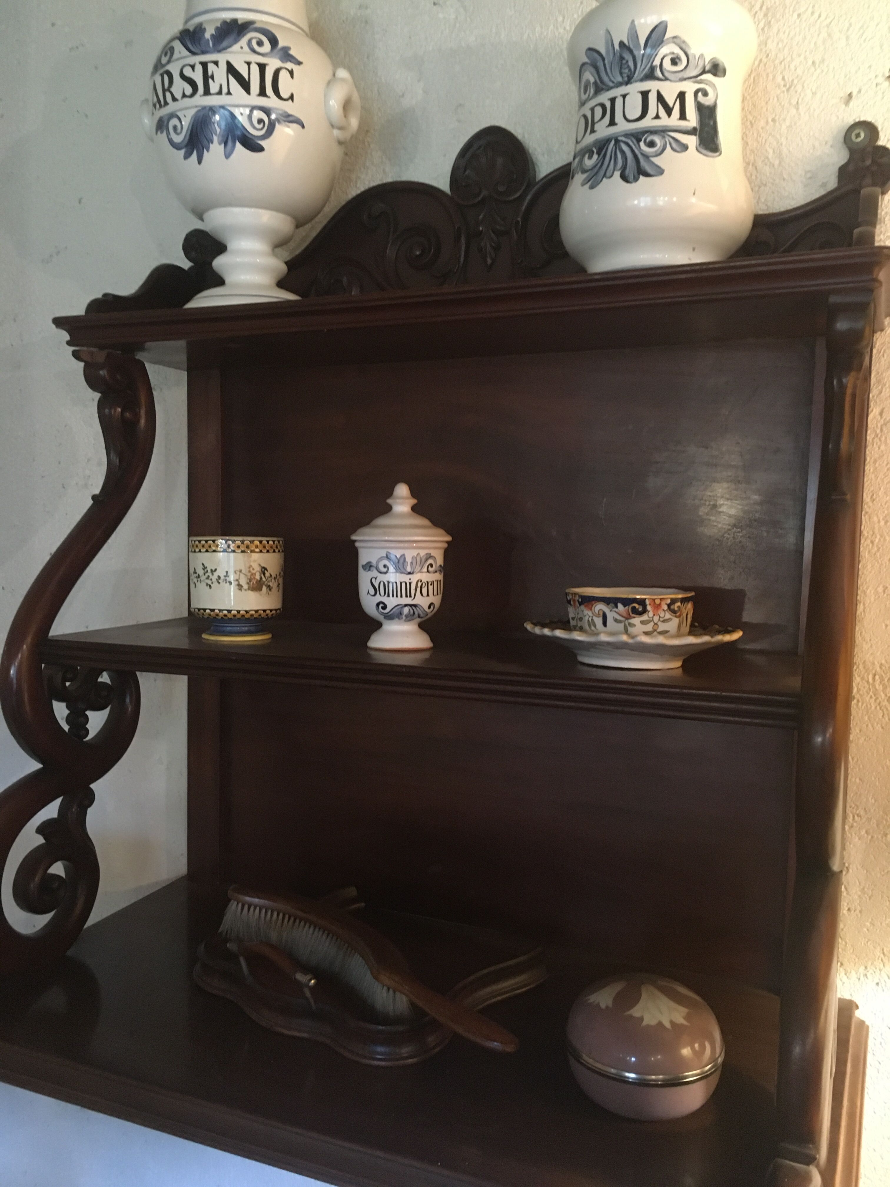 Carved wooden wall shelf.