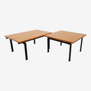 Suite of two vintage modernist Isa coffee tables in teak and black metal from the 60s