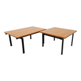 Suite of two vintage modernist Isa coffee tables in teak and black metal from the 60s