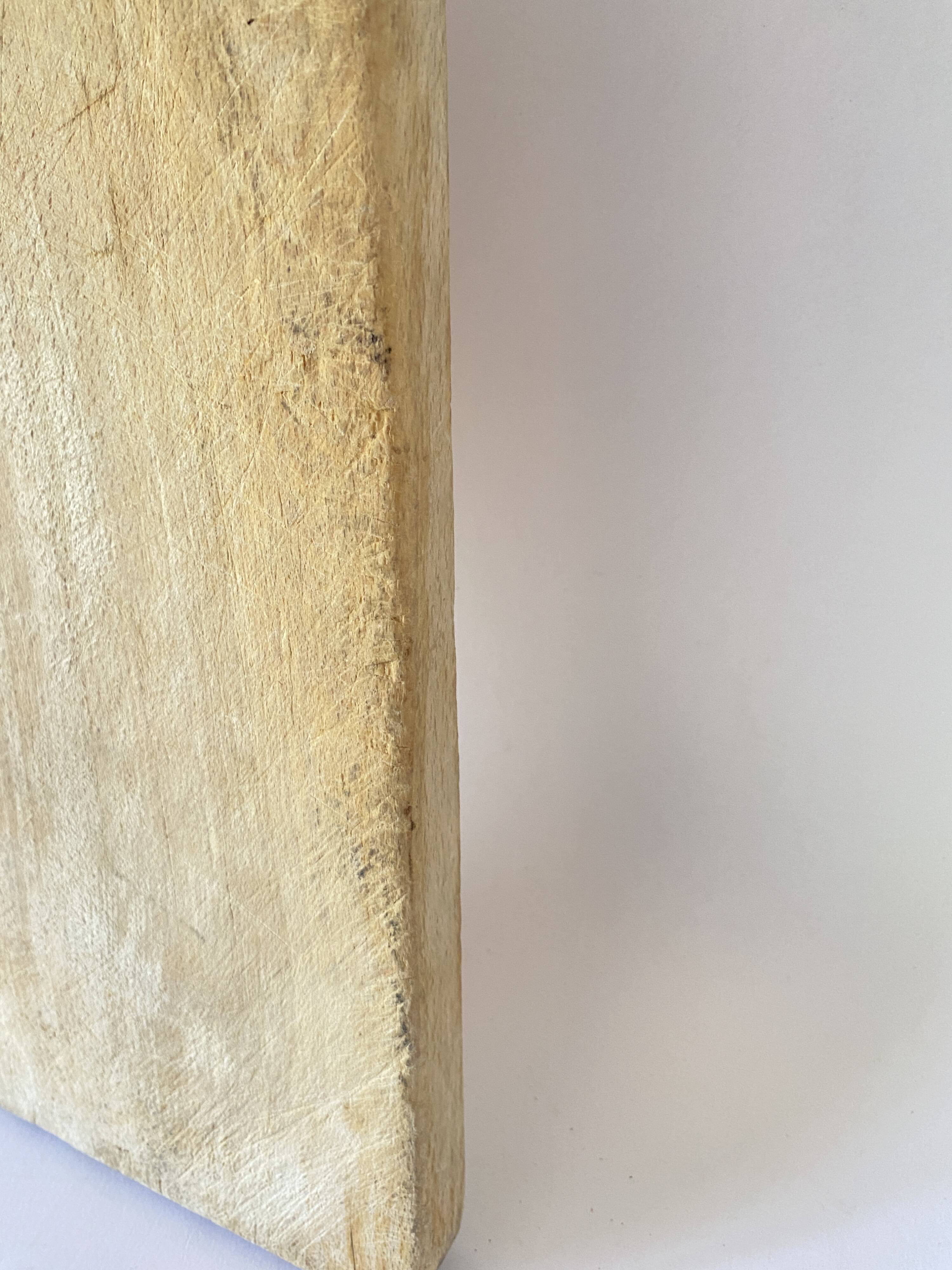 Butcher's cutting board with handle