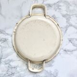 Old egg dish in creamy white and golden enamelled sheet