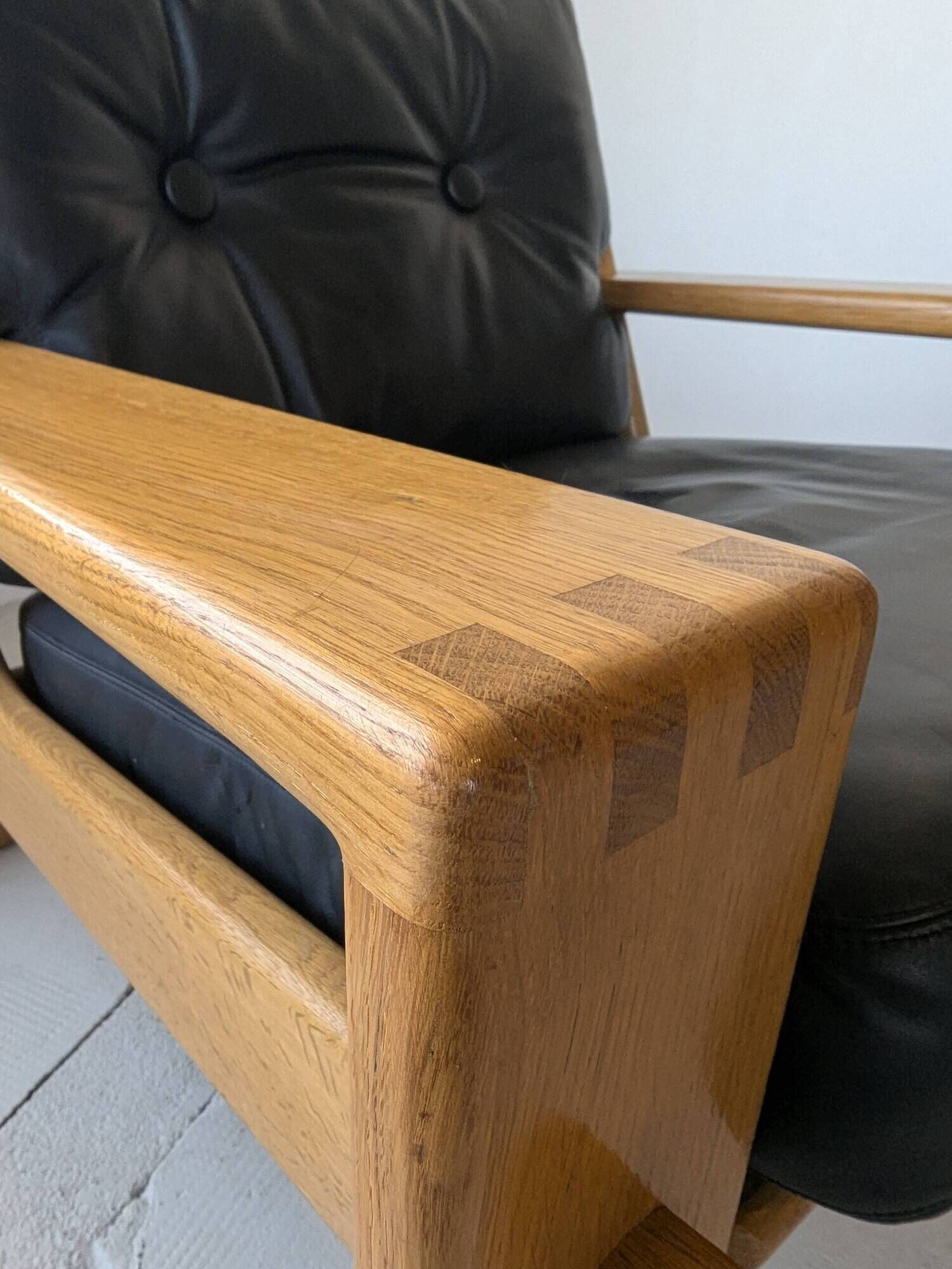 Pair of raw oak and leather armchairs by Esko Pajamies for Asko, Finland.