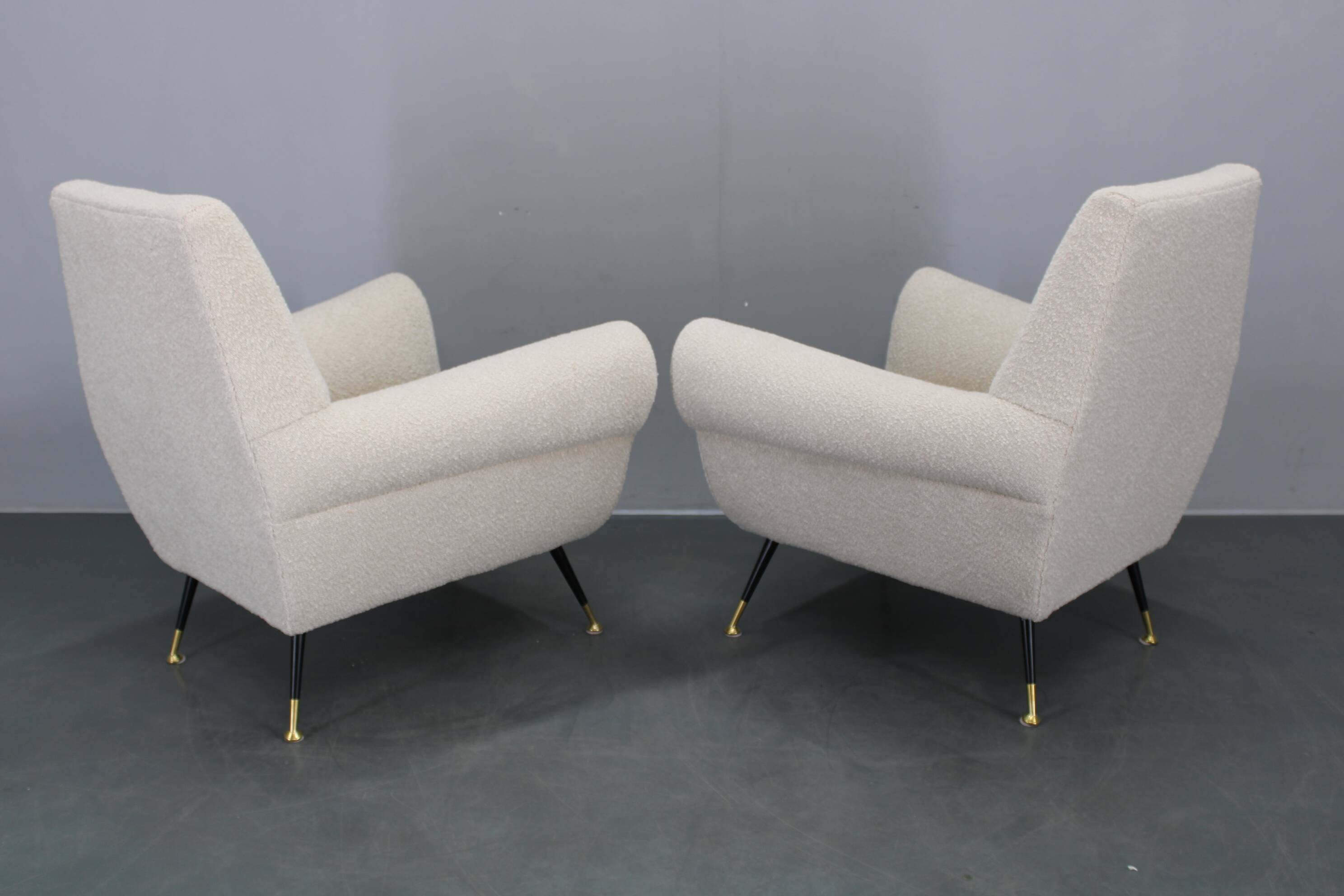 Pair of Italian mid-century boucle armchairs, iron & brass legs, 1950s