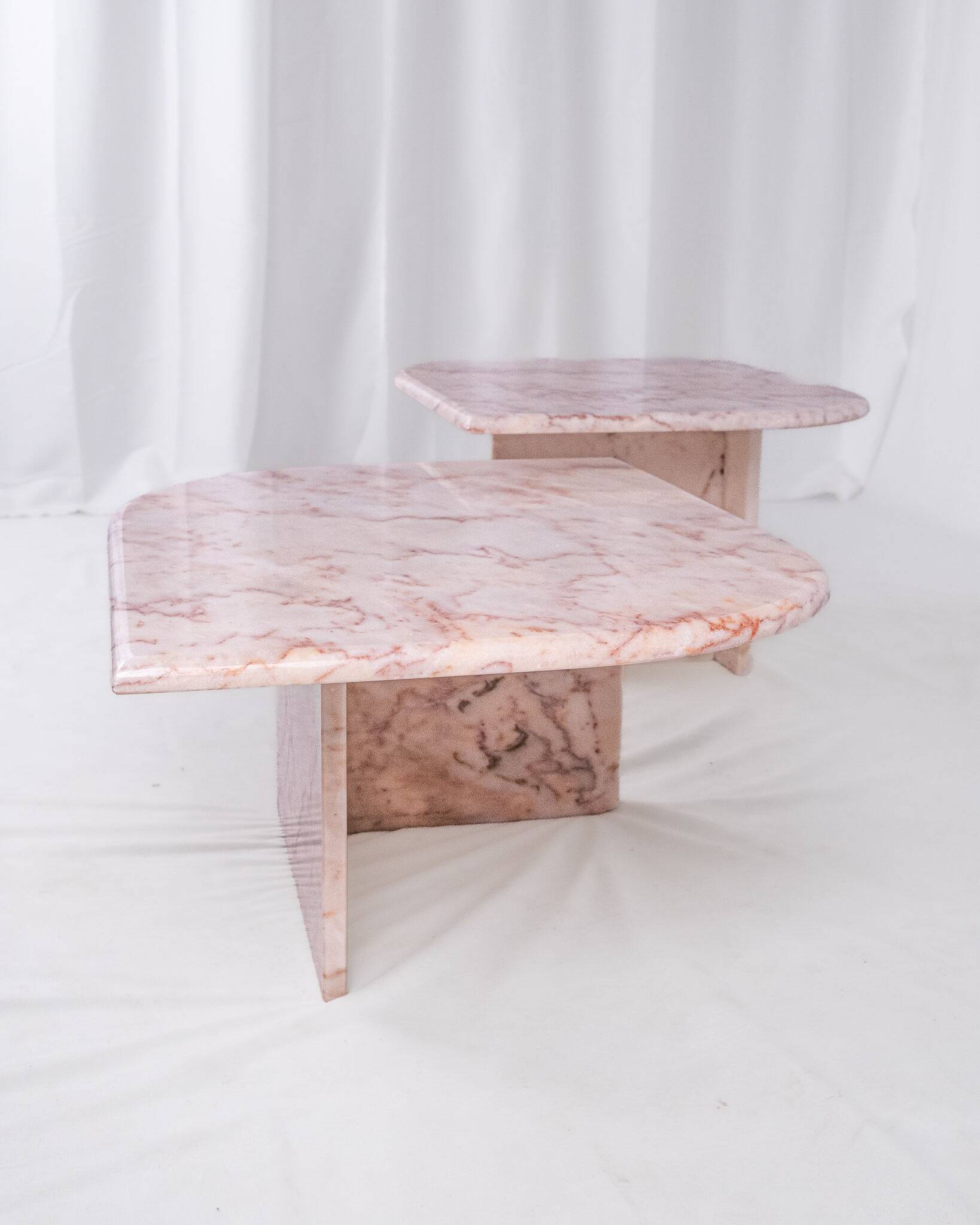 Pair of nesting coffee tables in pink marble, France, 1970s