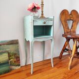 Patinated bedside table end of sofa