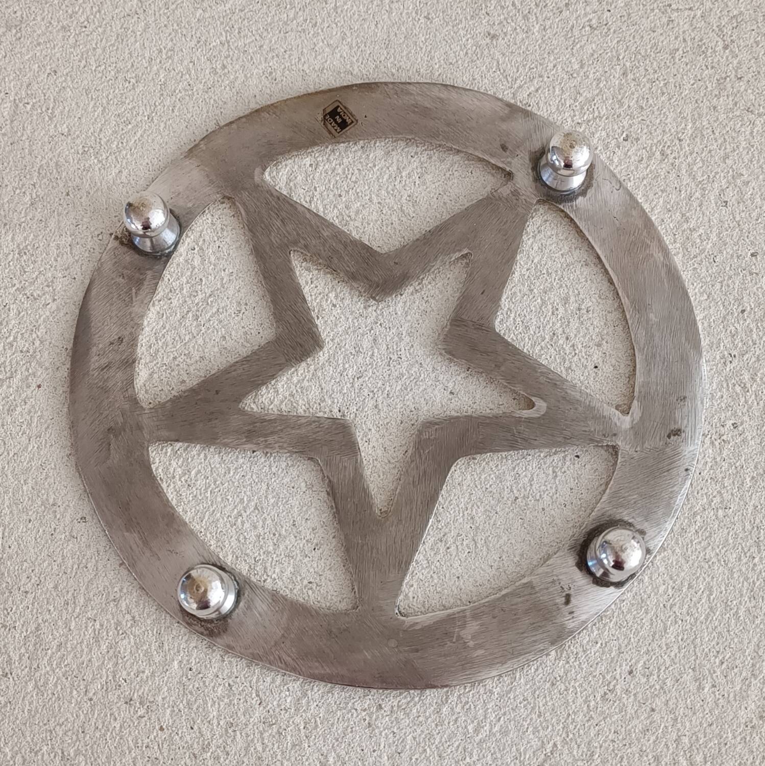 Star brass trivet