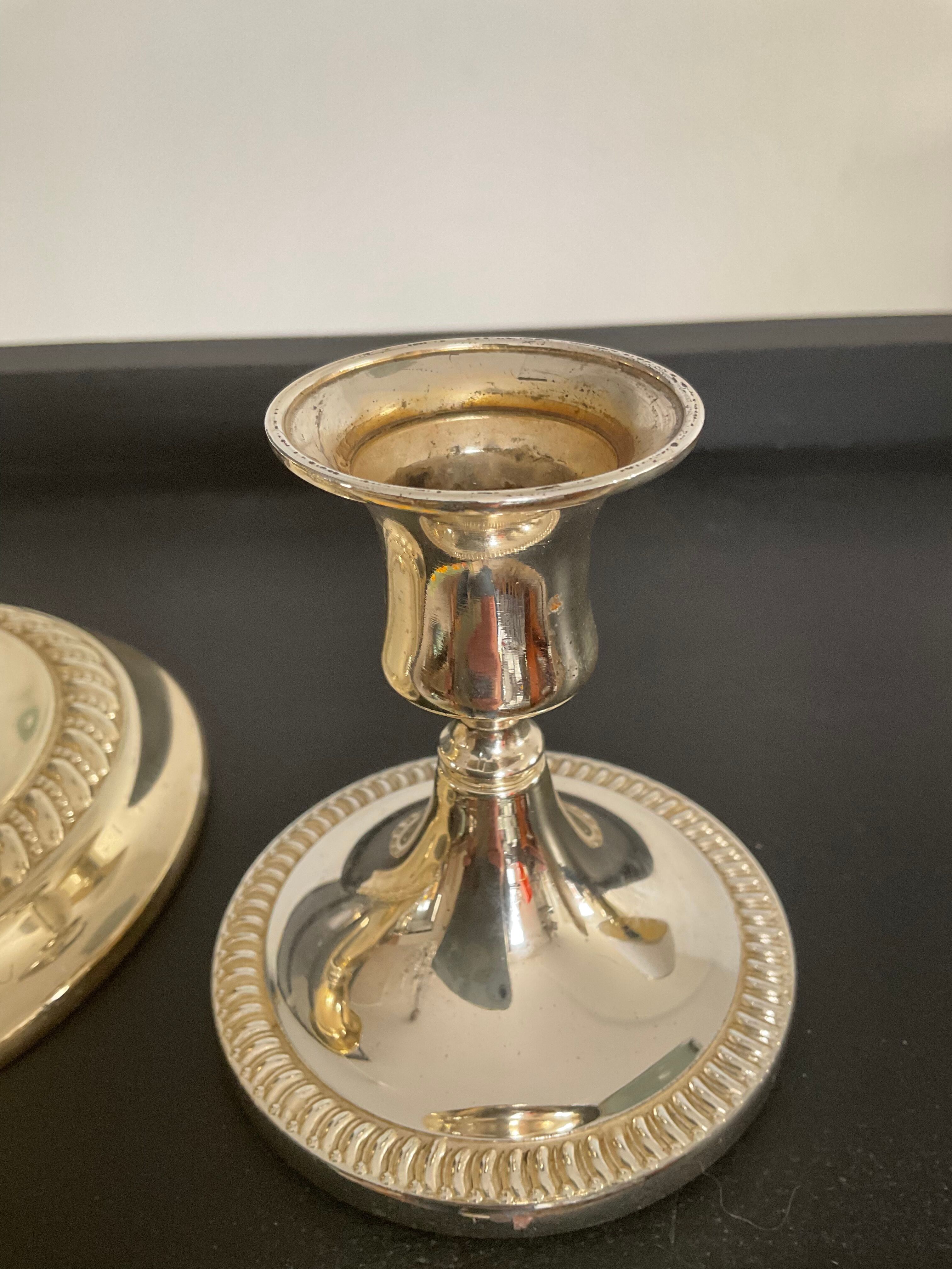 Series of 3 vintage candle holders in silver metal 70s