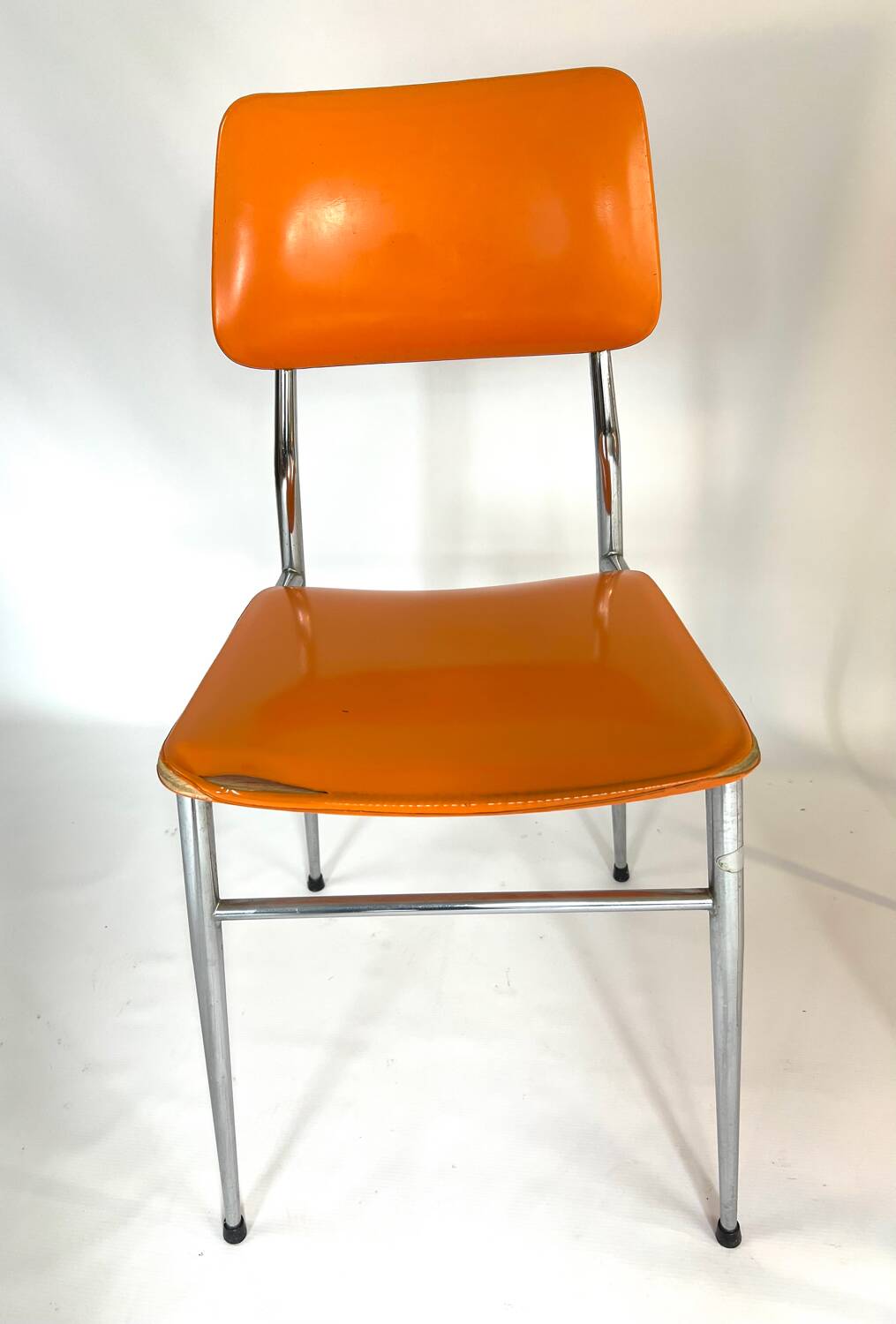 Pair of vintage orange leatherette chairs
