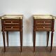 Pair of mahogany and brass side tables or bedside tables with Carrara marble tops.