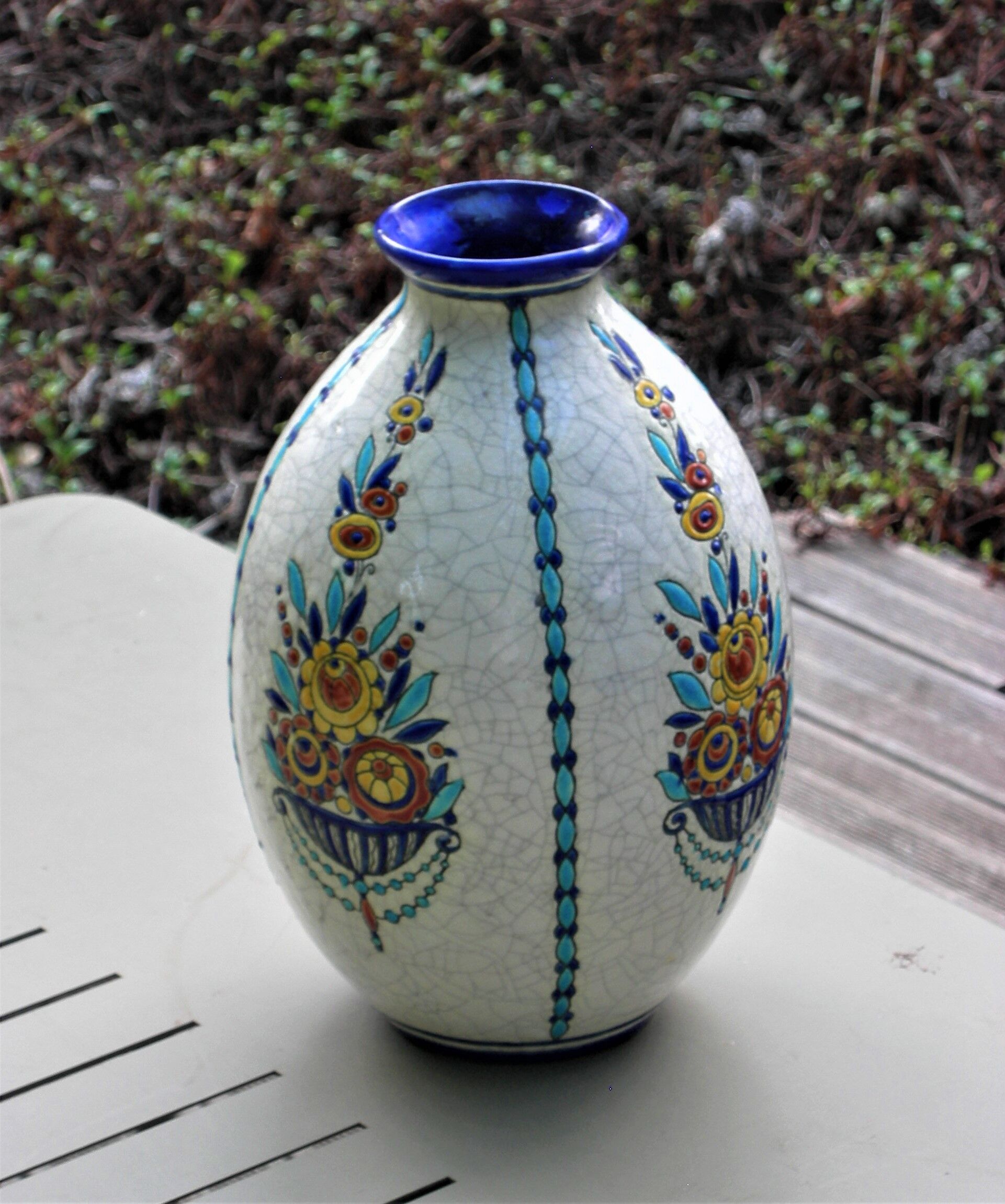 Boch La Louvière vase with a floral decoration in cracked faience