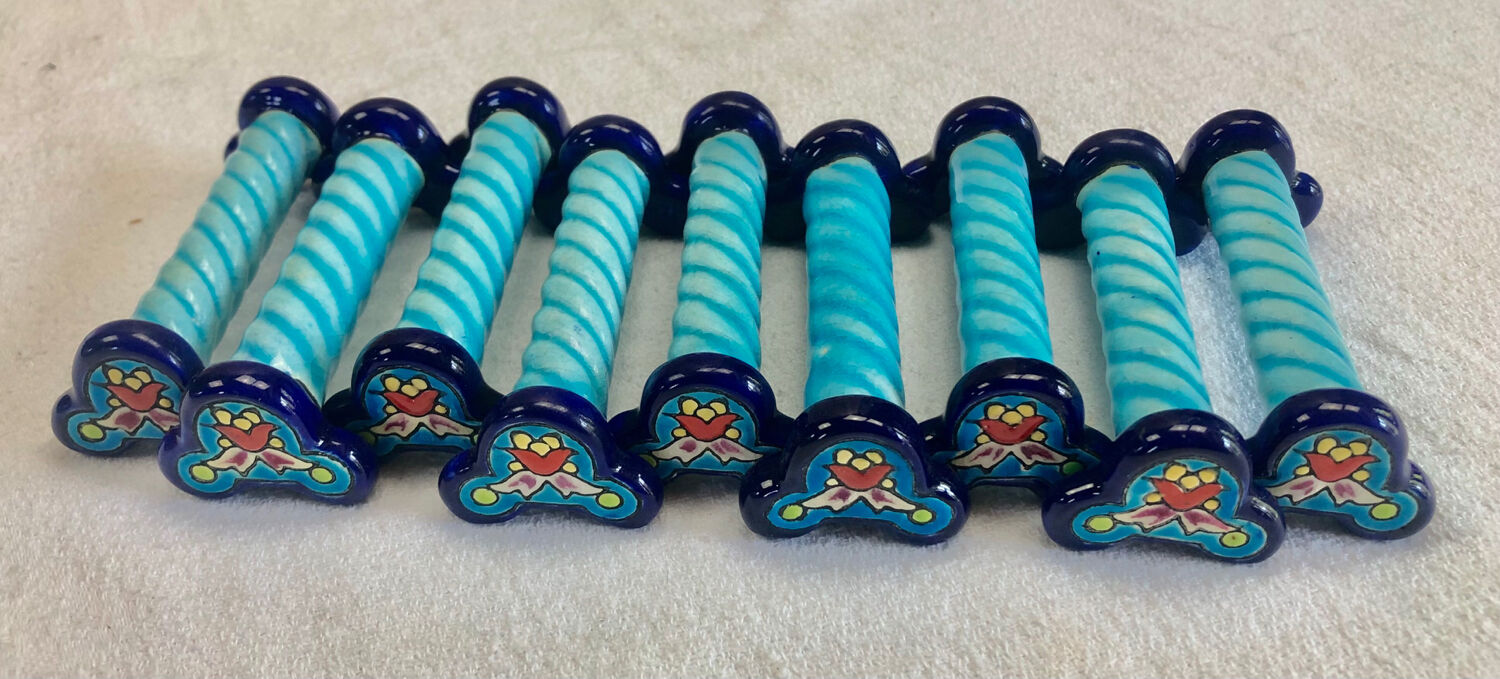 9 knife holders Enamels of Longwy