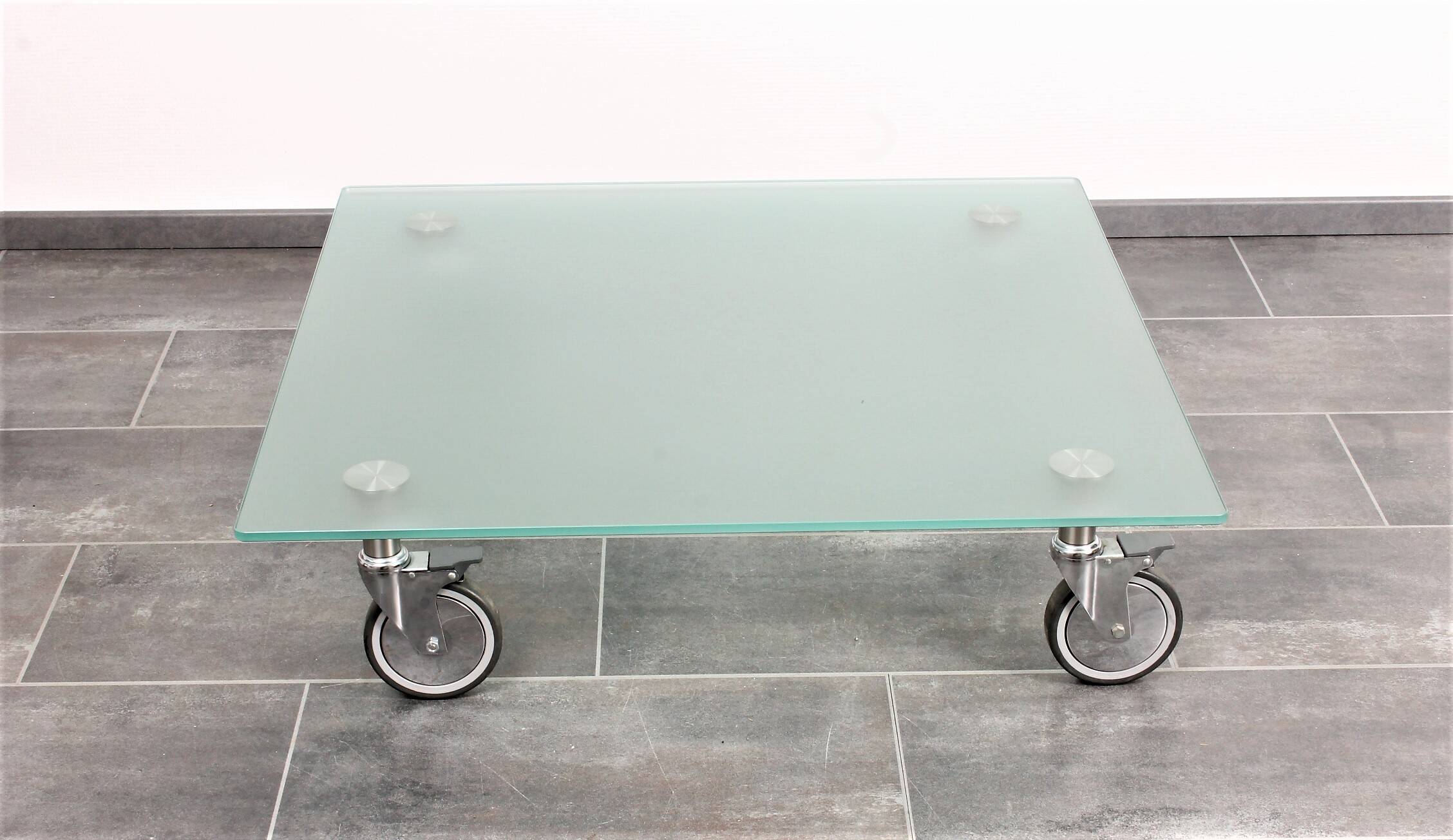 Wheeled glass coffee table
