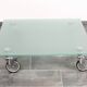 Wheeled glass coffee table