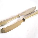 Two antique service knives in silver-plated metal, pearl frieze gowe alpacca.