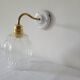 Porcelain, brass and glass wall lamp