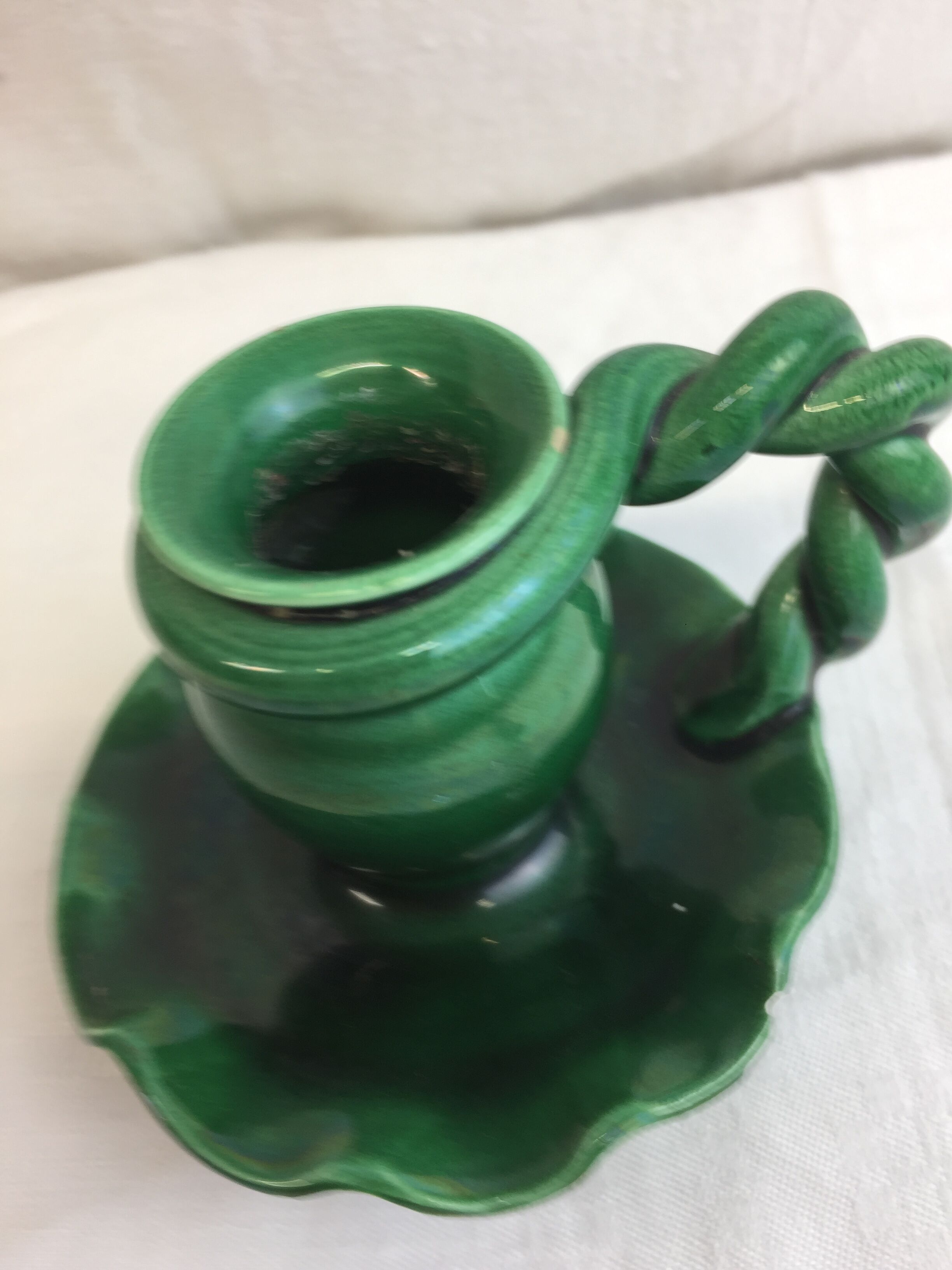 Old candleholder, glazed terracotta cellar, artisanal green color